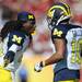 Michigan senior quarterback Denard Robinson celebrates a play with wide receiver Jeremy Gallon during the first half of the Outback Bowl at Raymond James Stadium in Tampa, Fla. on Tuesday, Jan. 1. Melanie Maxwell I AnnArbor.com